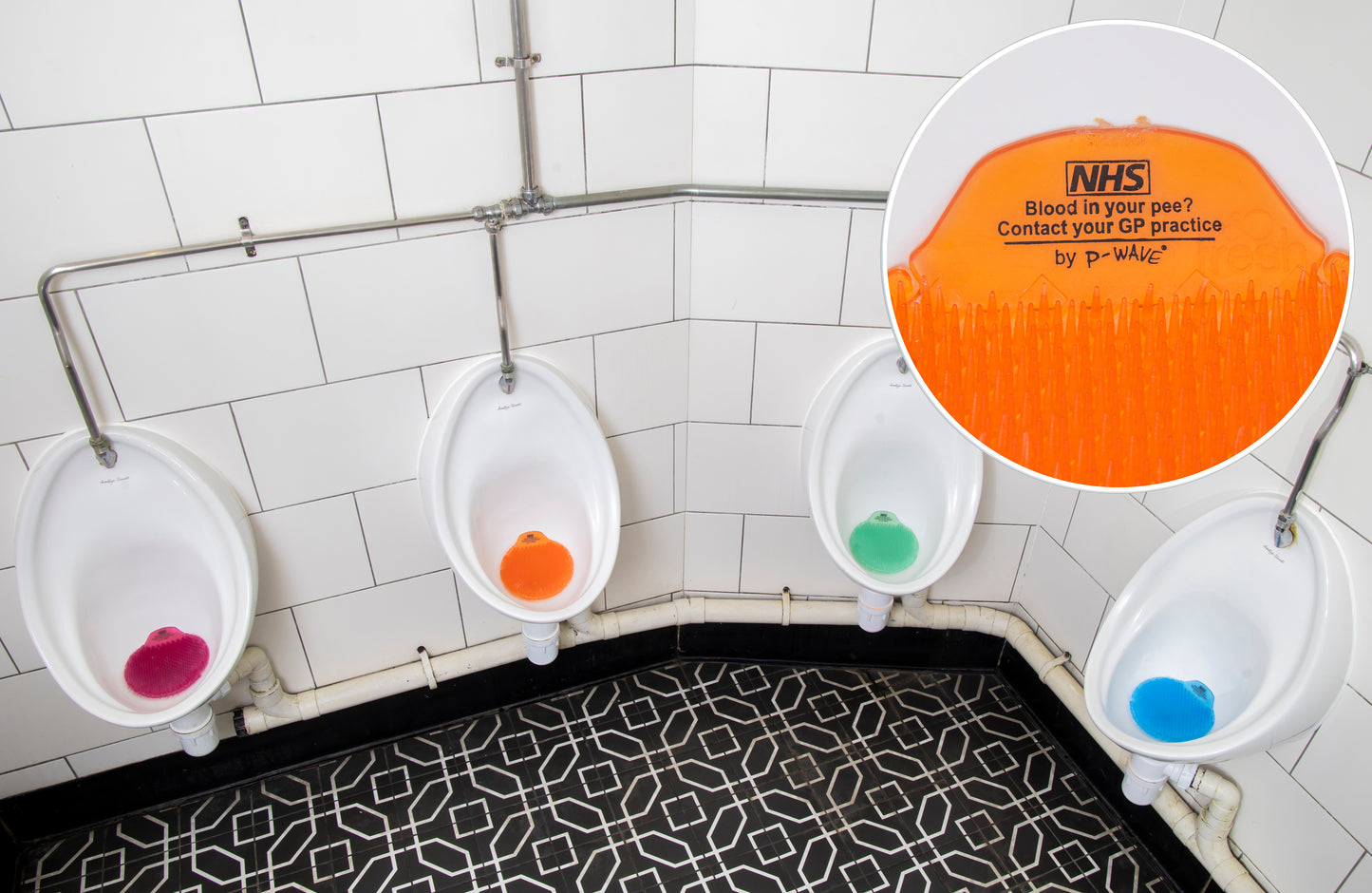 NHS mats in urinals with inset zoom image